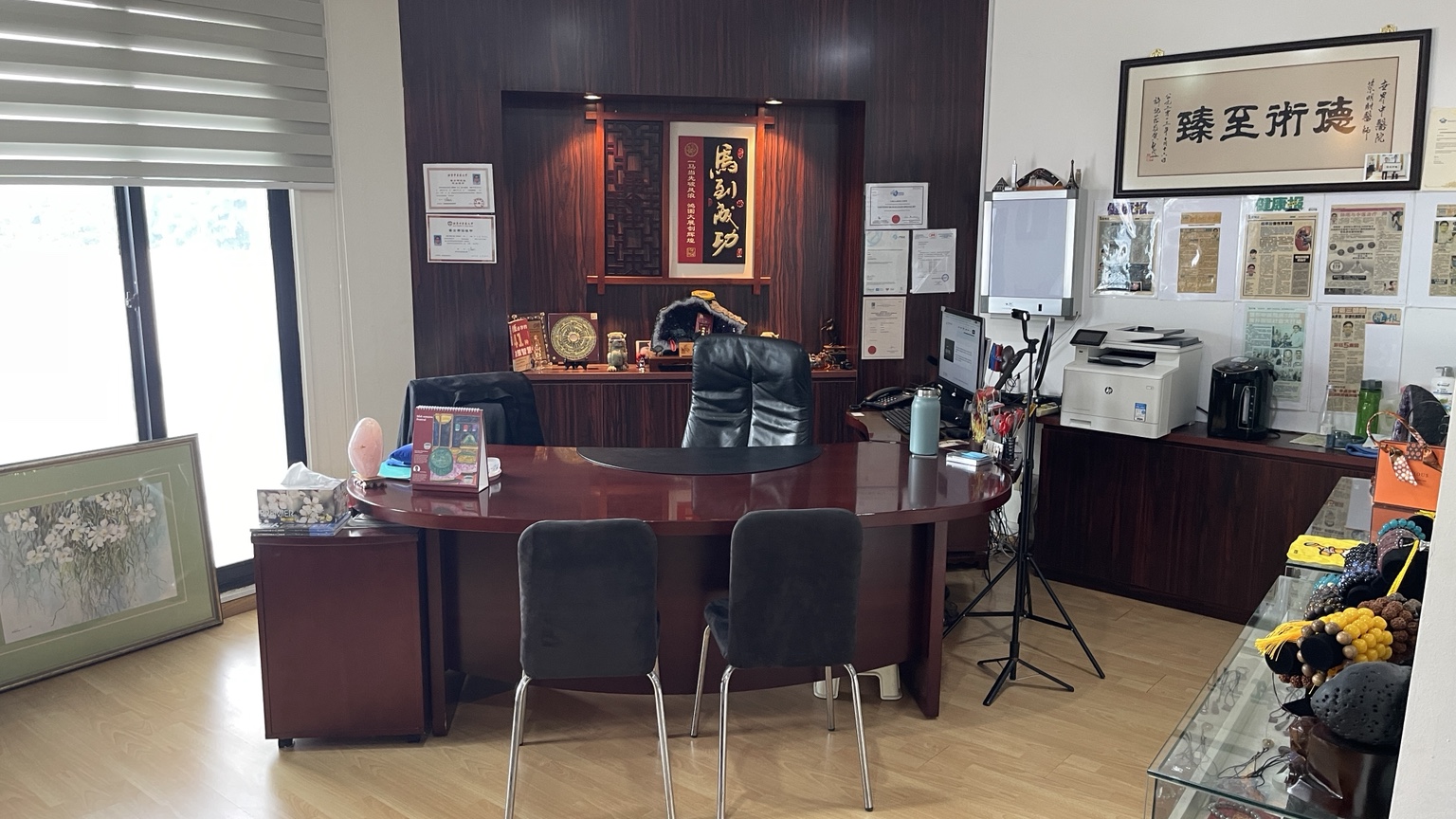 Consultation room with desk and visitor chairs